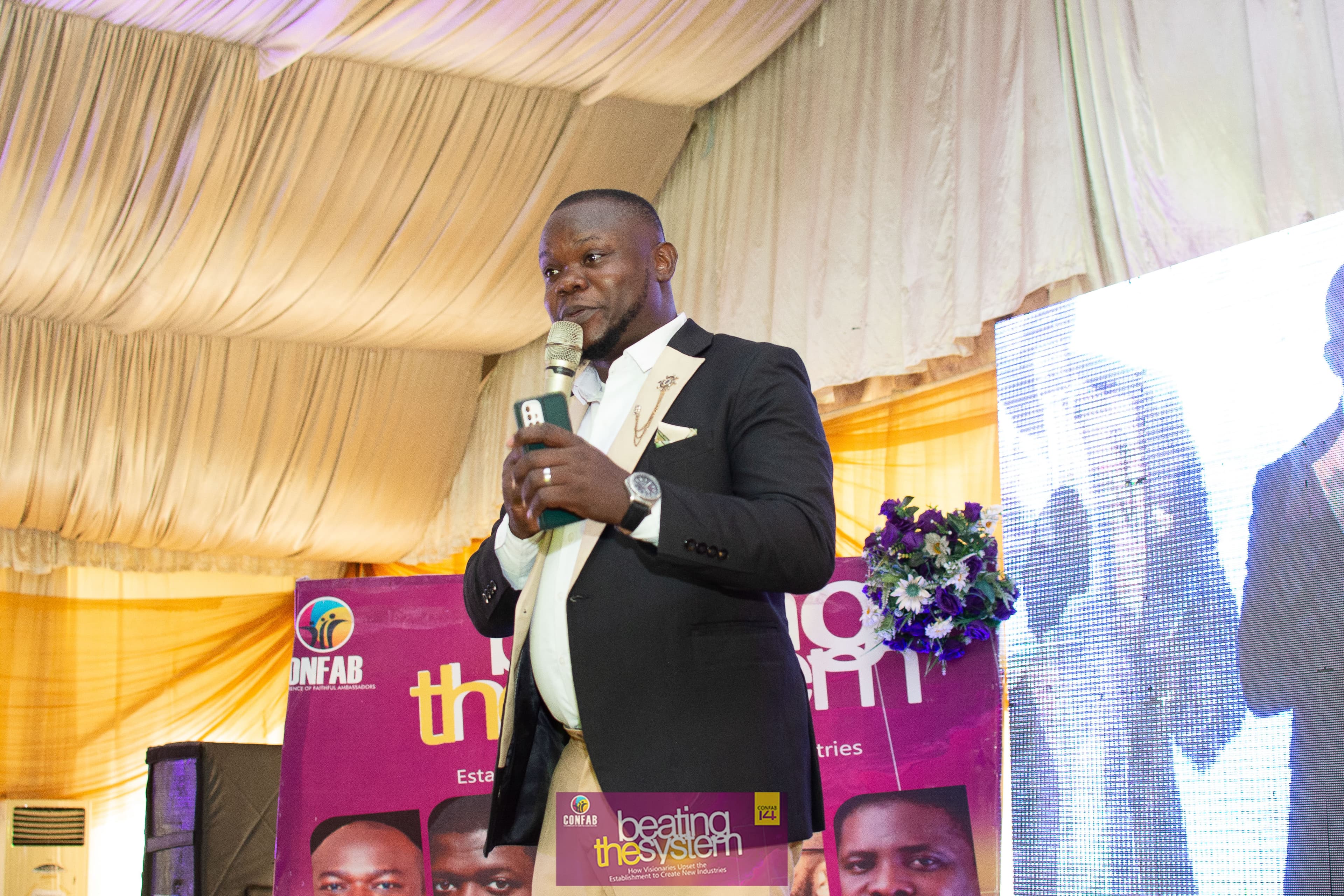 A CONFAB speaker addressing attendees